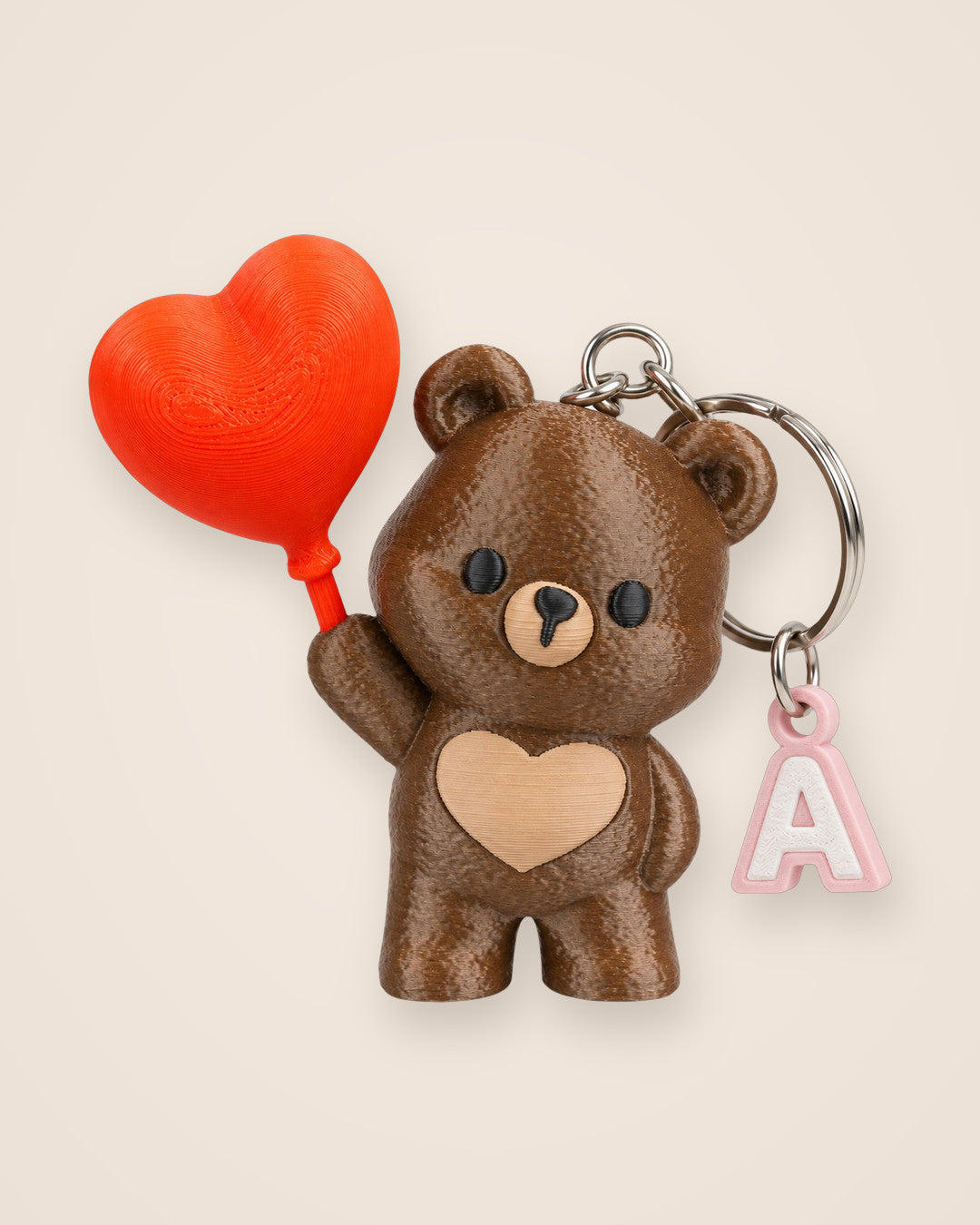 Heart Up Bear Initial Keyring: Brown bear raising a heart balloon, with your choice of initial