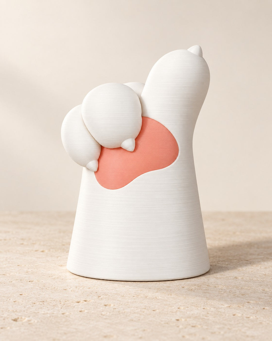 Paw Hold: White and pink paw that presents a favourite photograph
