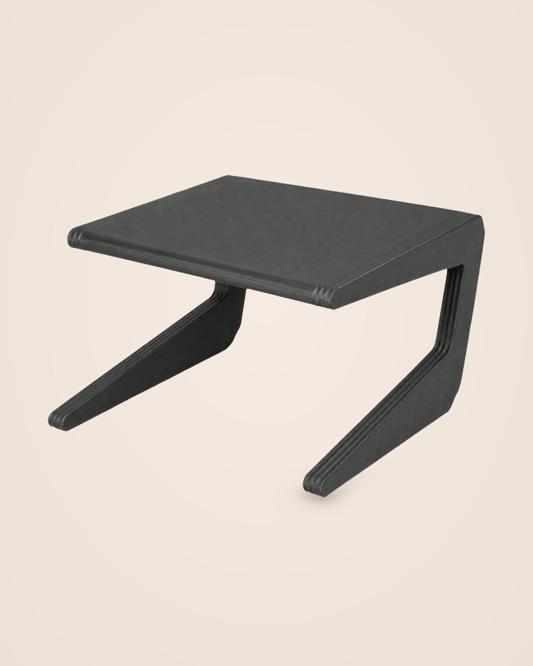 Narrow Shelf Riser: One-piece matte black riser for cupboard shelves