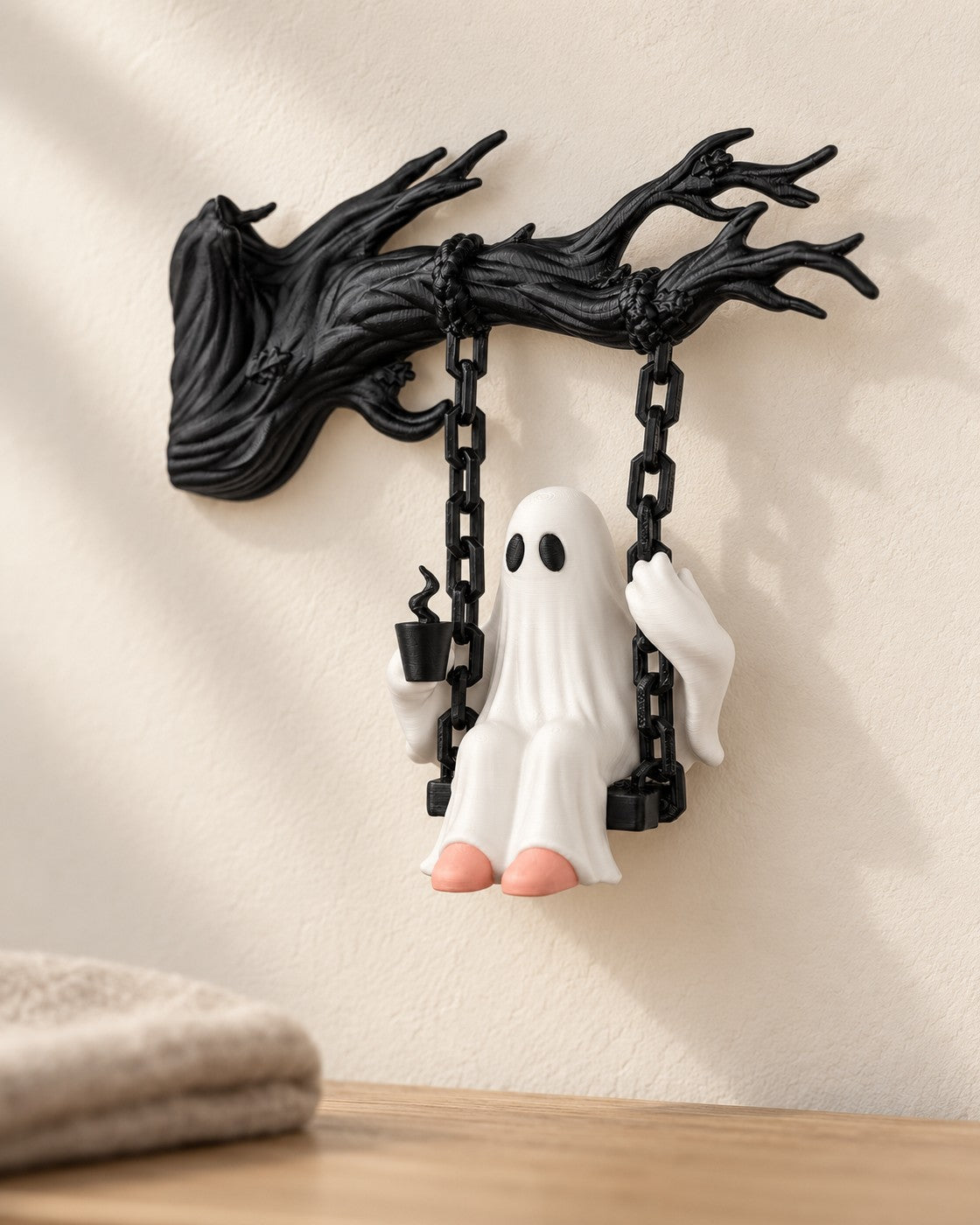 Ghost on a Swing in a calm, softly lit interior, shown at true scale