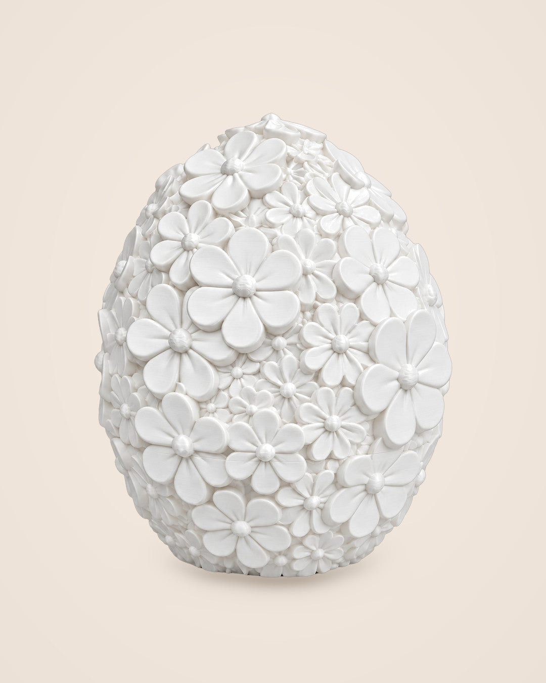 Daisy Bloom Egg Box: A matte white egg of sculpted daisies that opens into a keepsake box