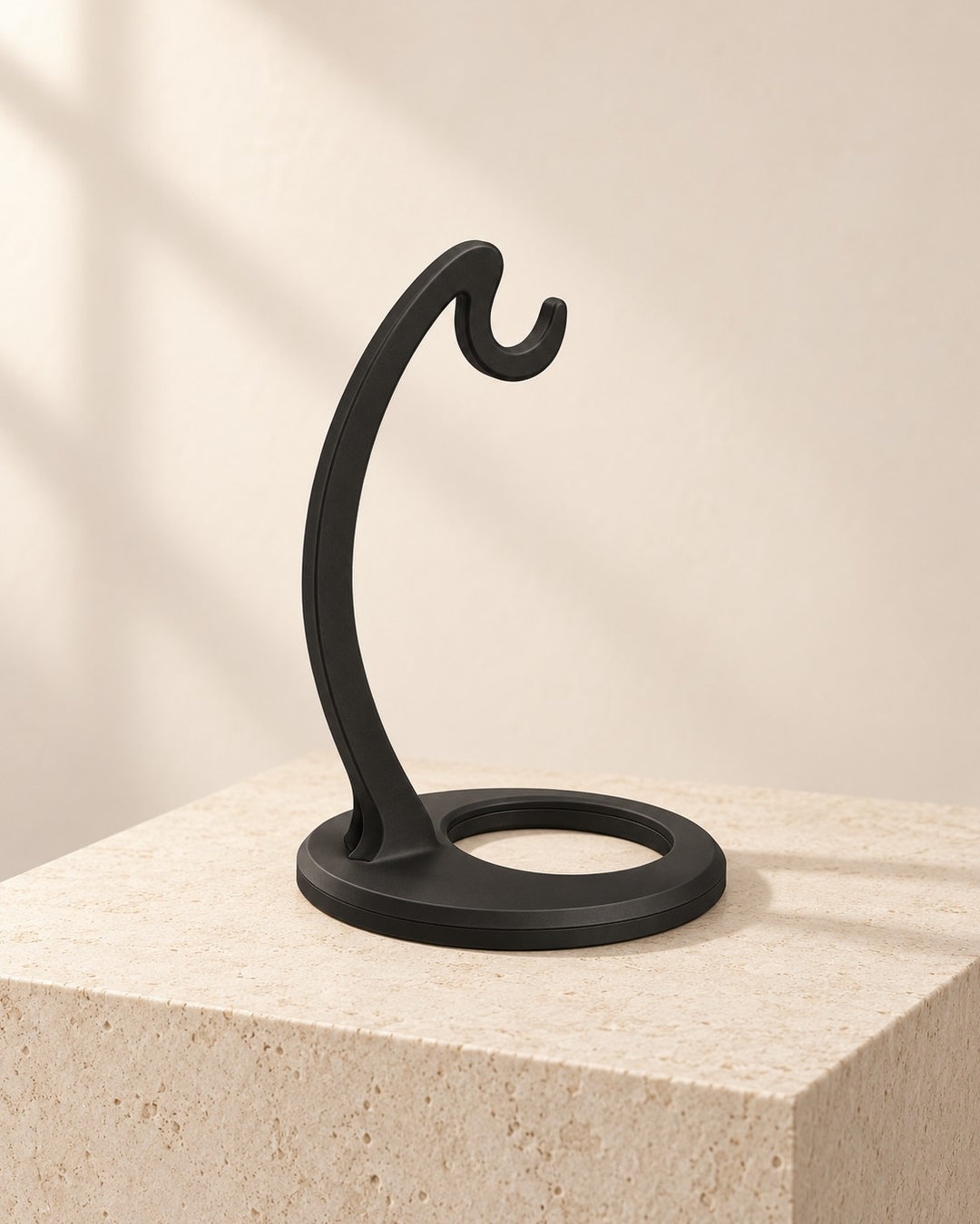 Matte Black Banana Hanger: Curved countertop hanger that lets bananas hang freely