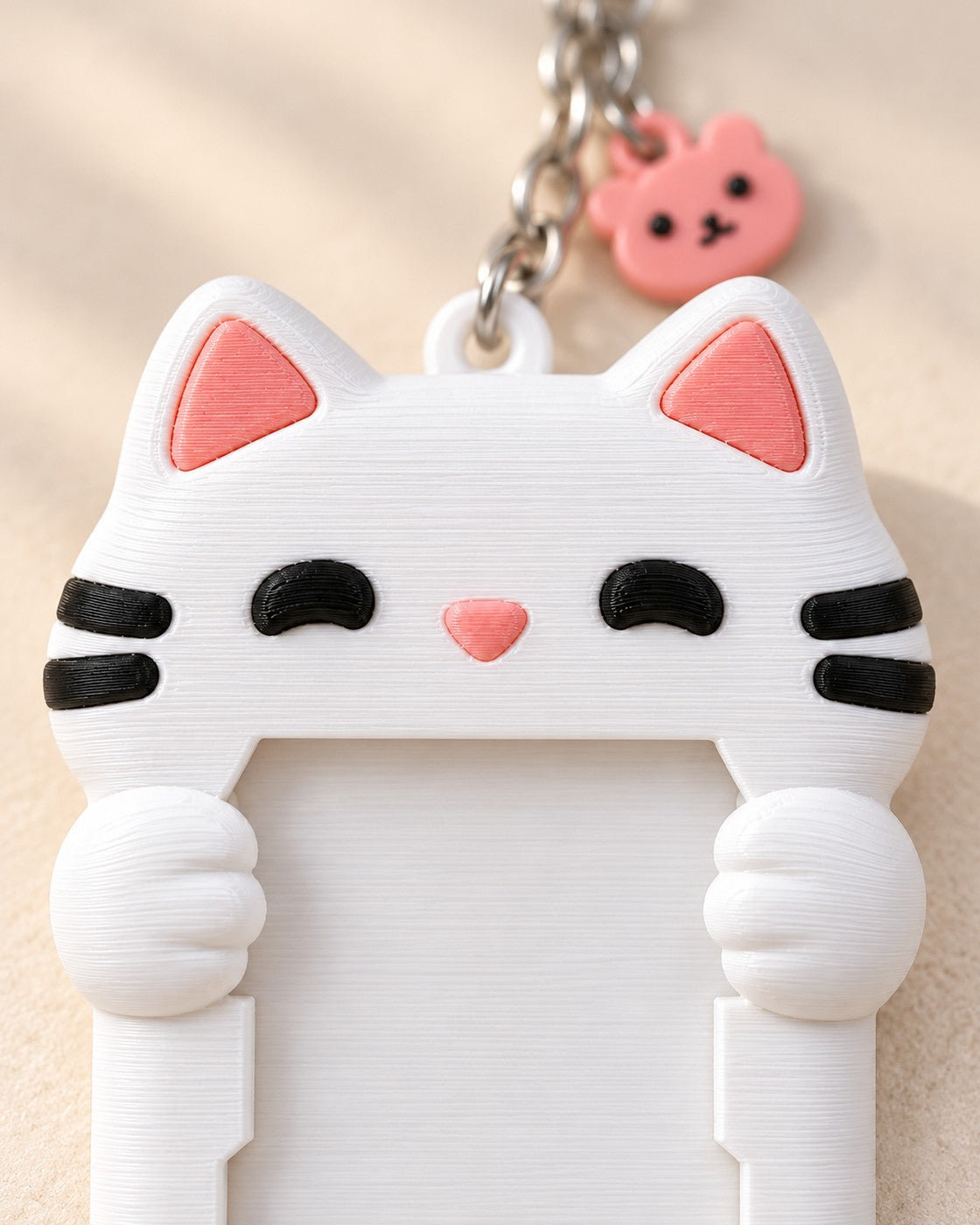 Close-up of the Cat Photocard Keyring Set showing fine printed layer lines