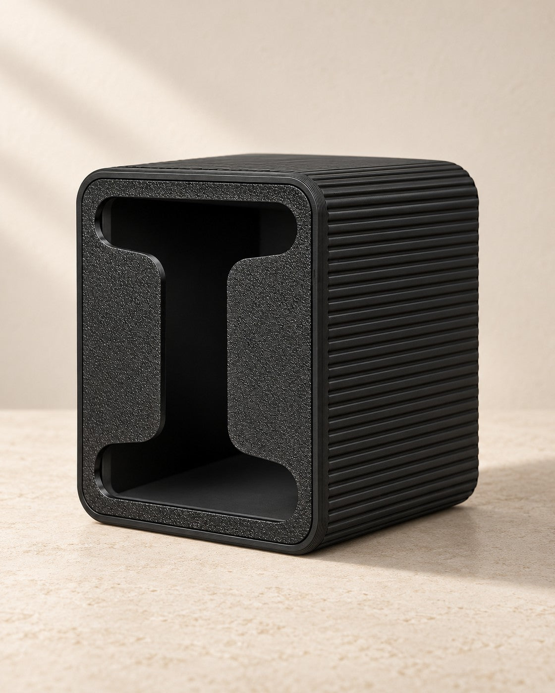 Tea Bag Dispenser on a pale limestone plinth, soft studio light