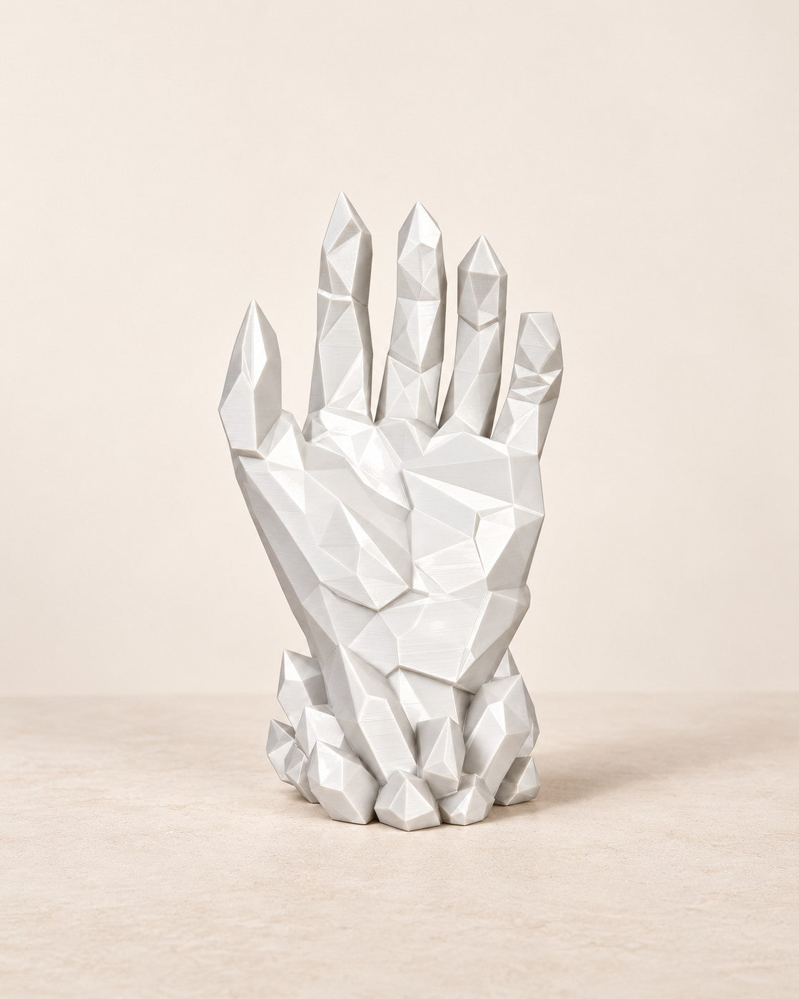 Crystal Hand Stand on a pale limestone plinth, soft studio light