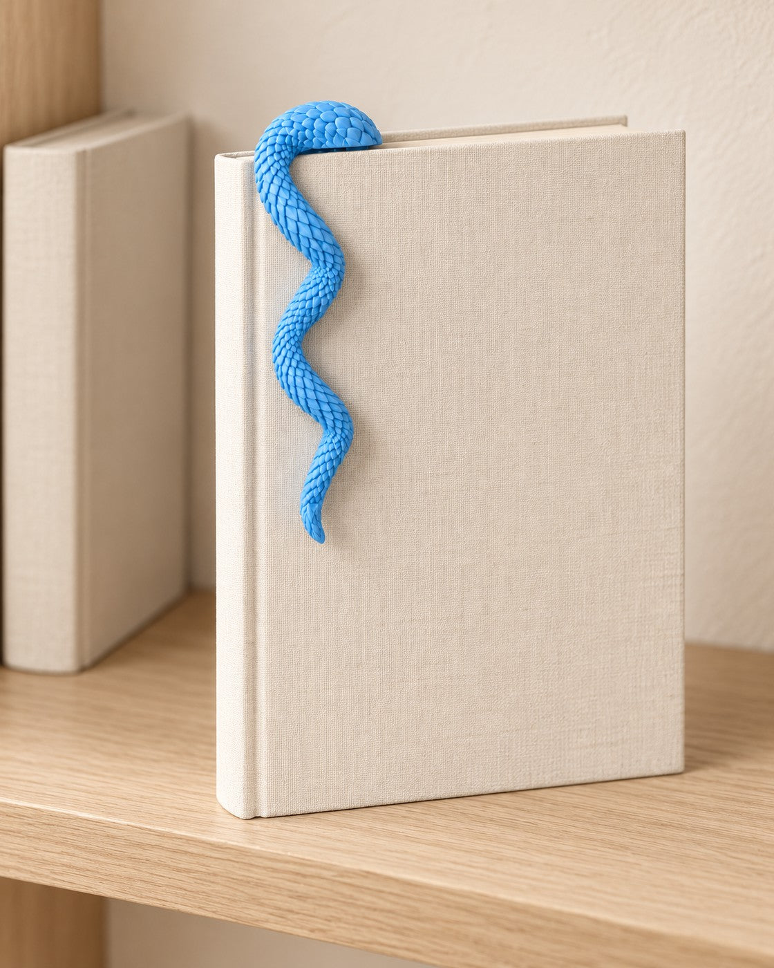 Dragon Tail Bookmark in a calm, softly lit interior, shown at true scale