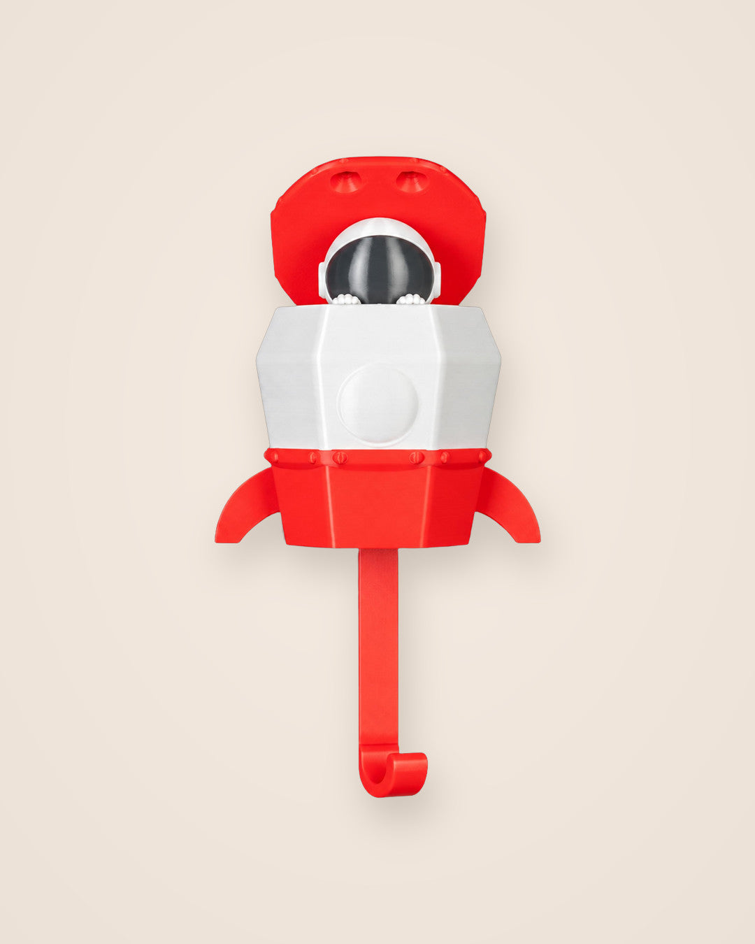 Pop-Up Astronaut Key Holder: A wall hook where a small astronaut rises from a rocket