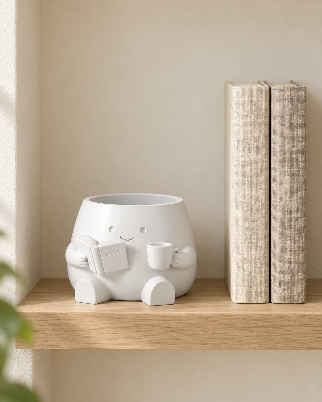 Book Lover Planter in a calm, softly lit interior, shown at true scale