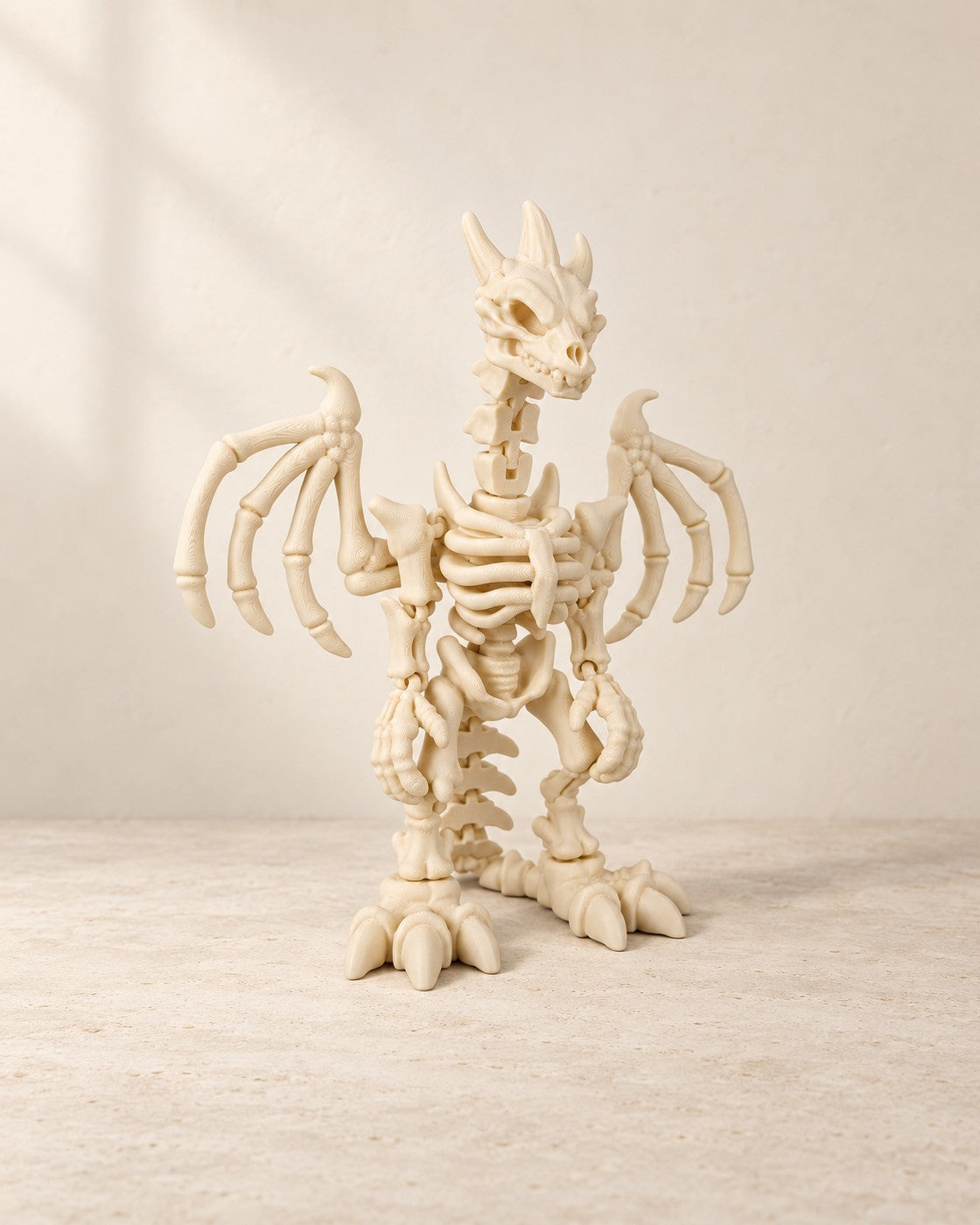 Skeleton Dragon on a pale limestone plinth, soft studio light