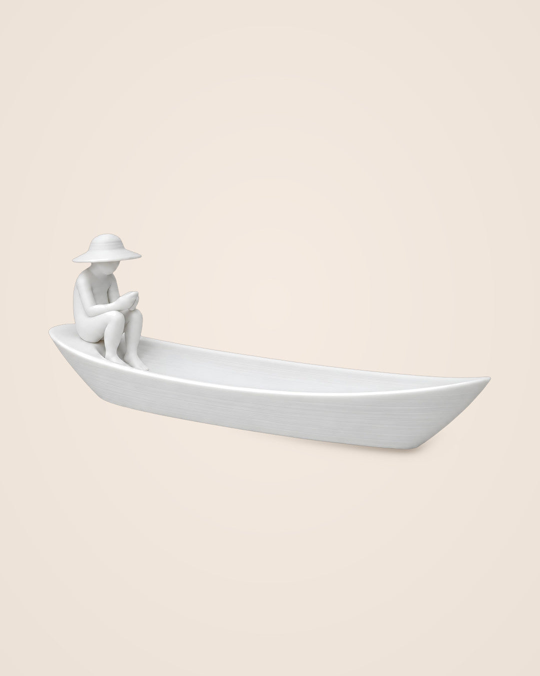 Fisherman Boat Incense Holder: A seated fisherman in a long boat that catches the ash