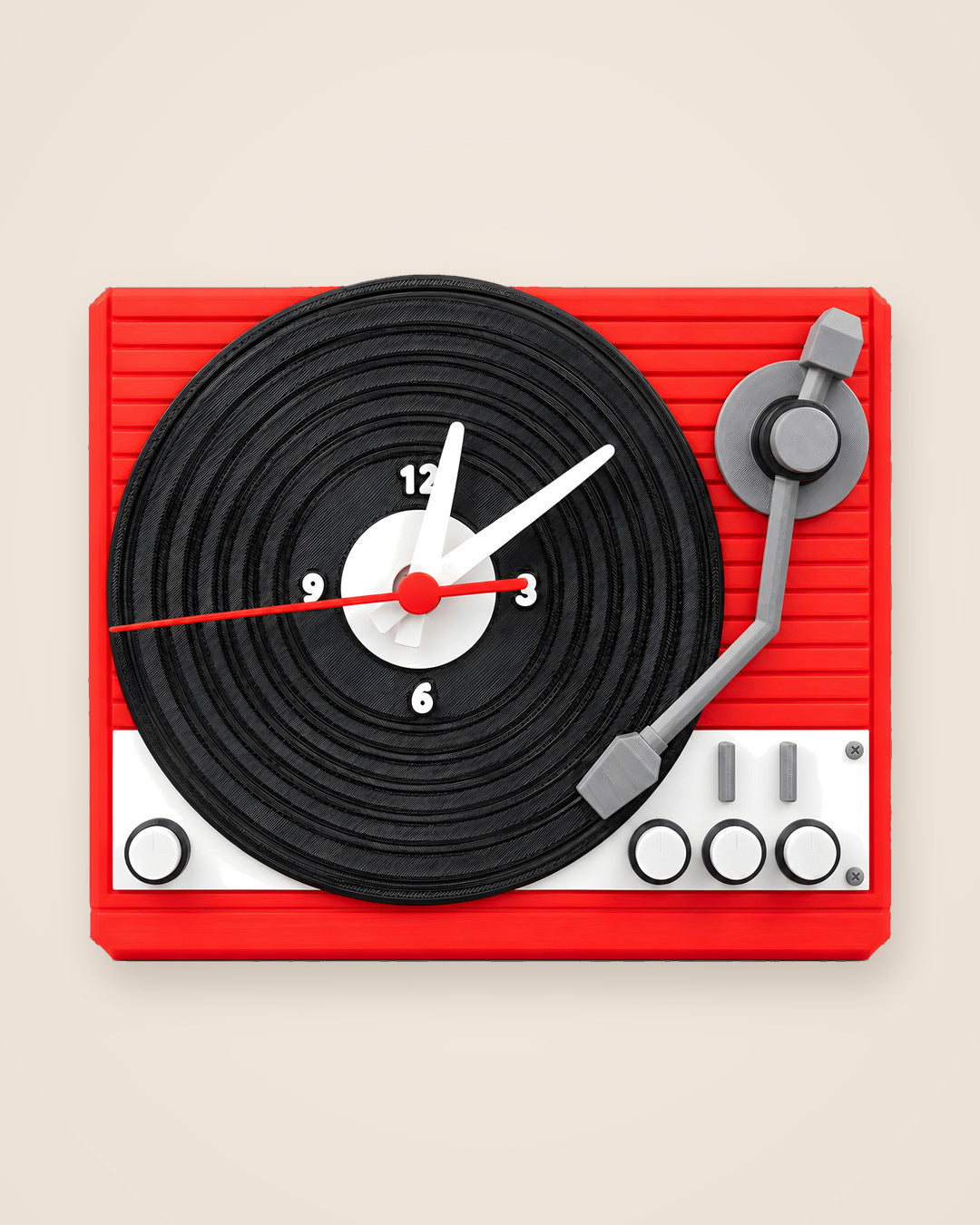 Turntable Wall Clock: Red record-player clock with a grooved vinyl dial and quartz movement