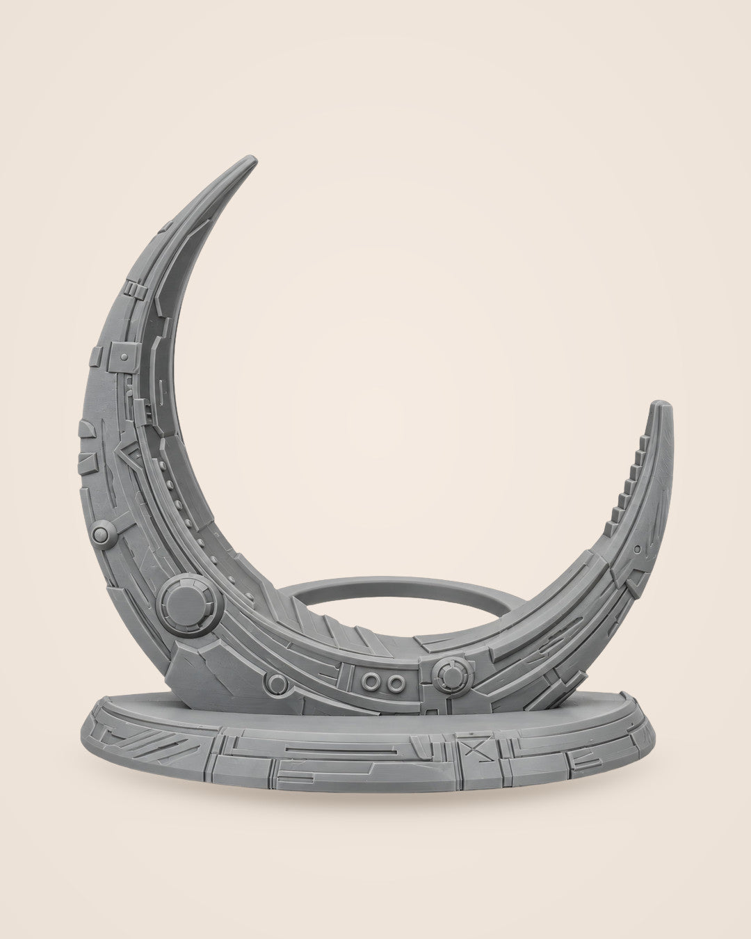Robot Moon Console Stand: Panel-lined crescent that holds a slim console upright, in matte grey