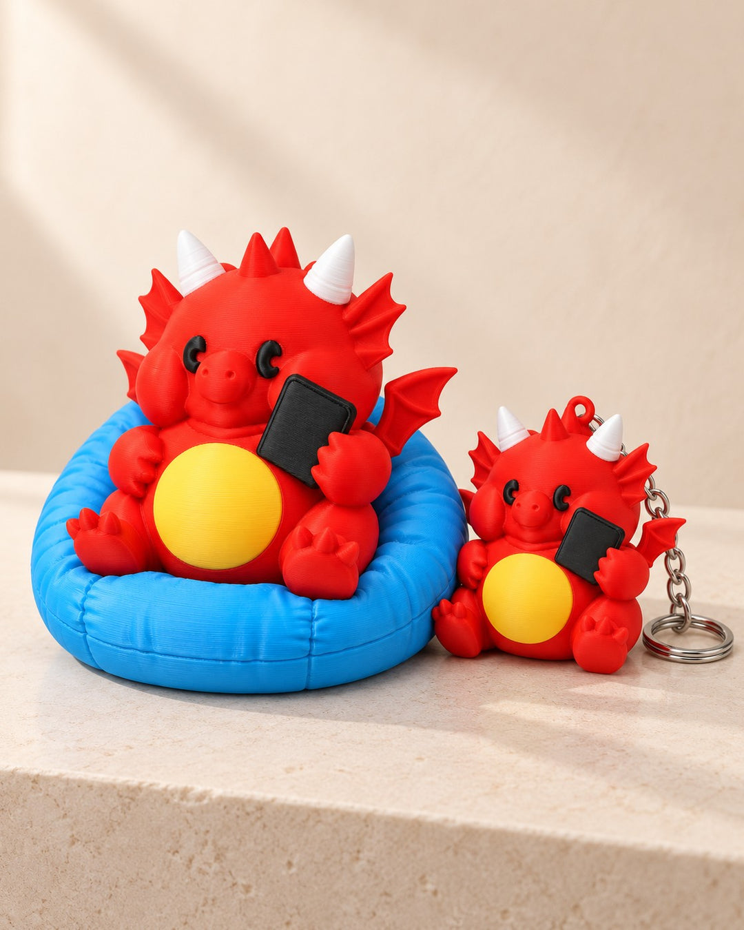 Chubby Dragon on Beanbag: Lift-out red dragon figurine with a matching keyring dragon