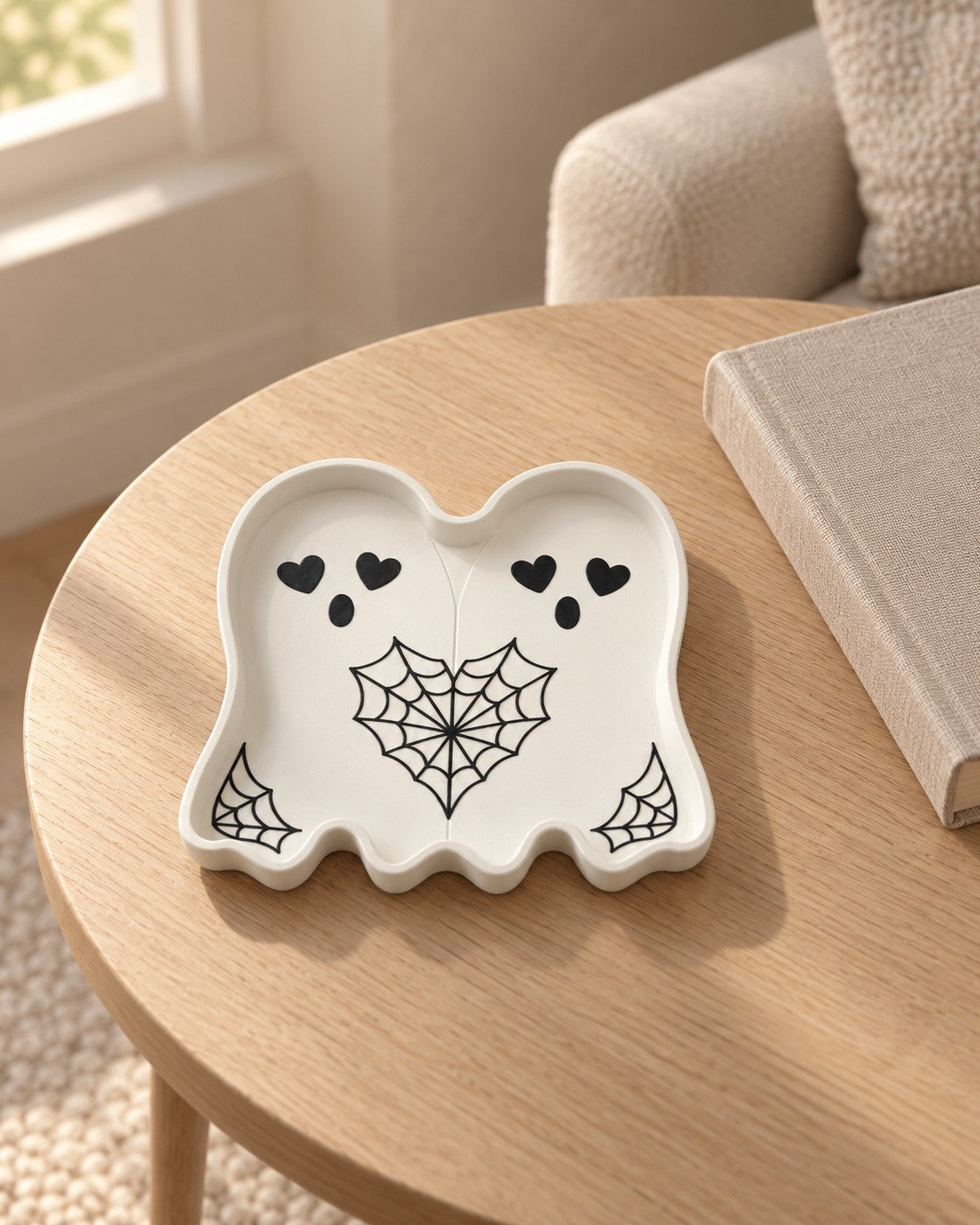 Ghost Duo Trinket Dish in a calm, softly lit interior, shown at true scale