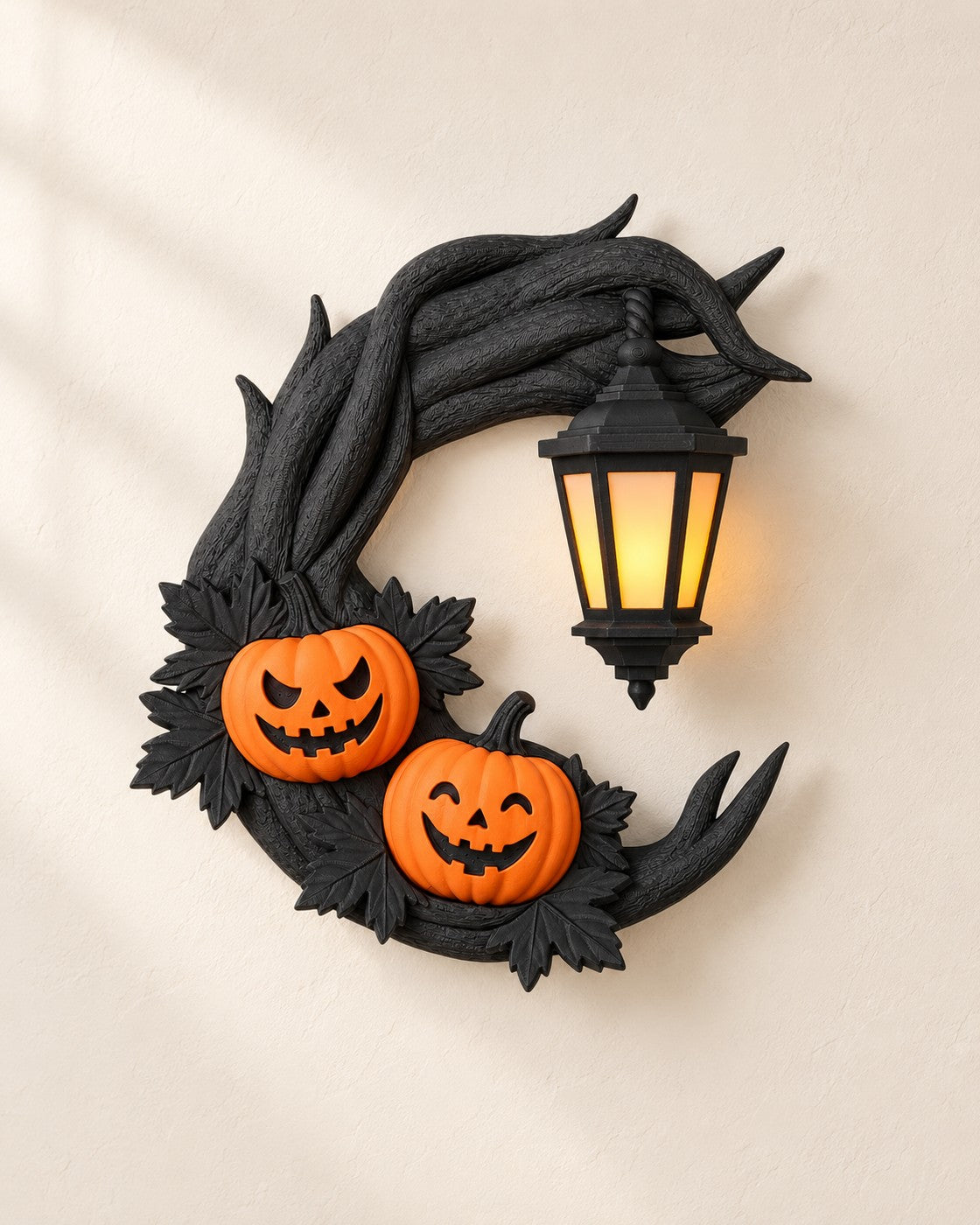 Pumpkin Moon Wreath on a pale limestone plinth, soft studio light