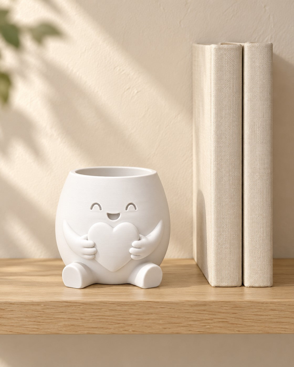 Heart Hug Planter in a calm, softly lit interior, shown at true scale