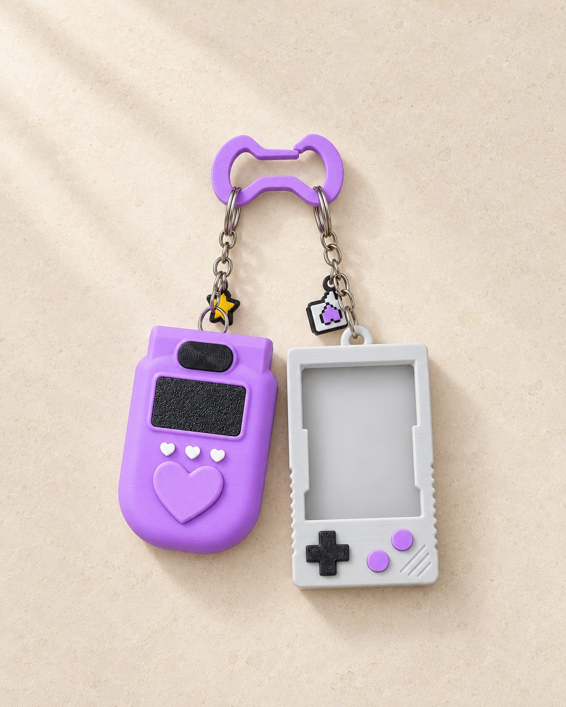Pixel Pocket Keyring Set on a pale limestone plinth, soft studio light