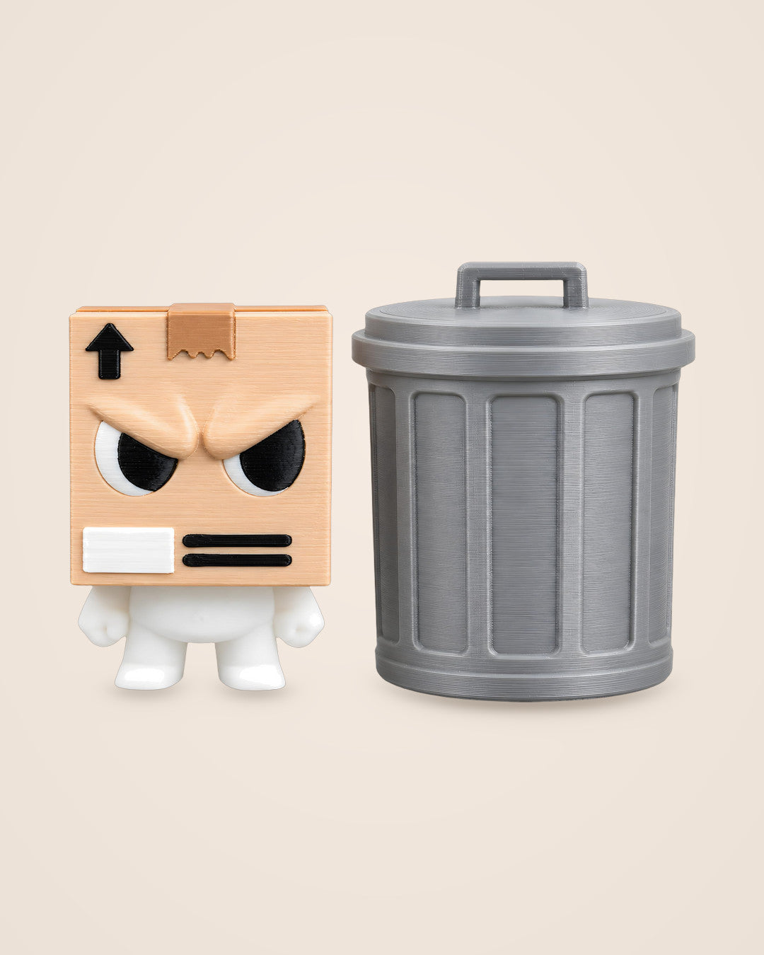 Grumpy Parcel Figurine: A cardboard-box-head character with a lift-off lid mini dustbin
