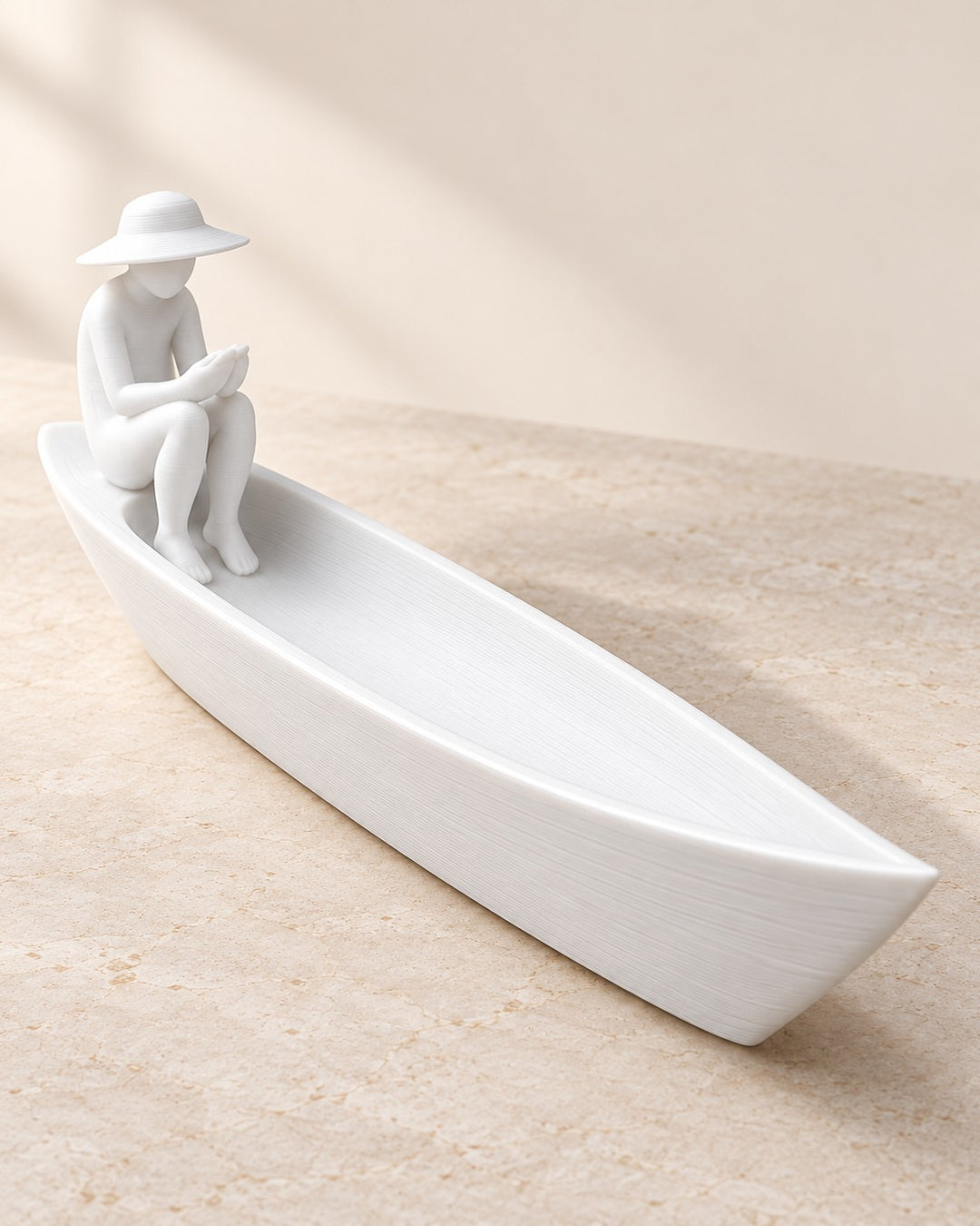 Fisherman Boat Incense Holder: A seated fisherman in a long boat that catches the ash