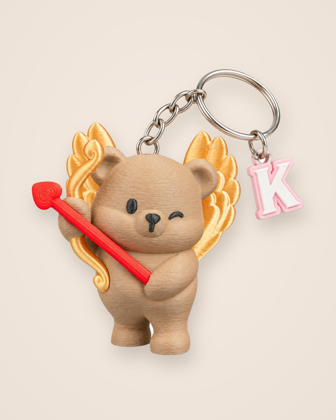 Cupid Cub Initial Keyring: A winking bear with golden wings and a chosen initial charm, A to Z