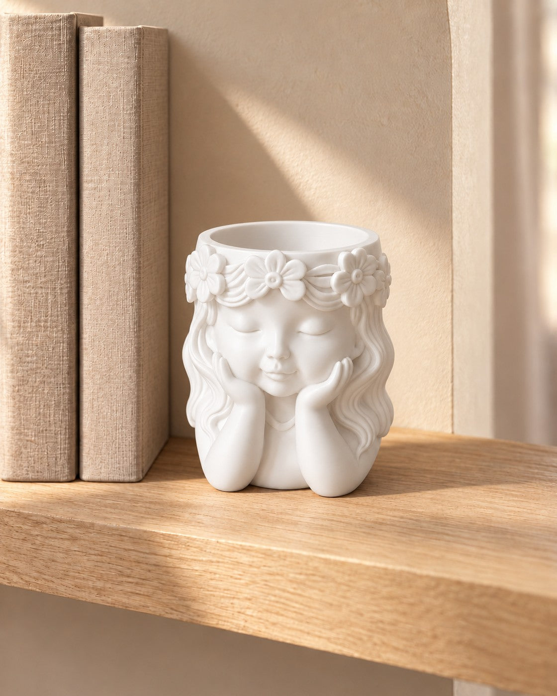 Sculpted Face Vase in a calm, softly lit interior, shown at true scale