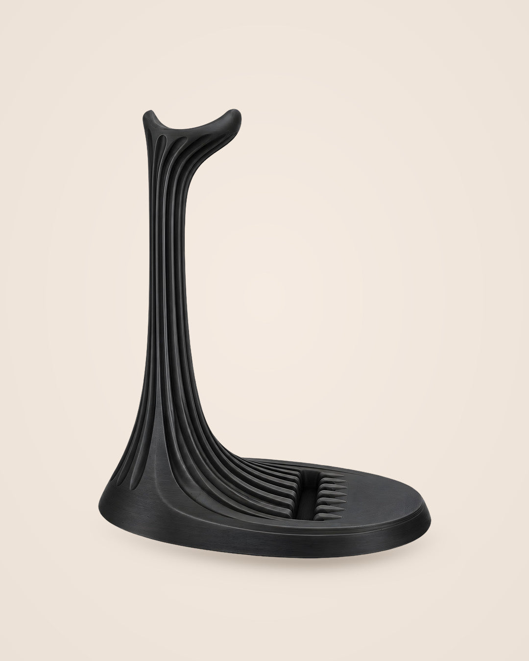 Ribbed Headphone Stand: A sculpted column with a built-in slot for your phone