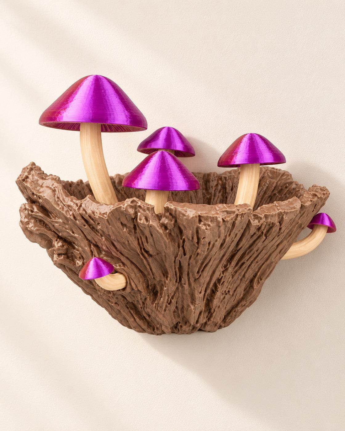 Mushroom Wall Planter on a pale limestone plinth, soft studio light