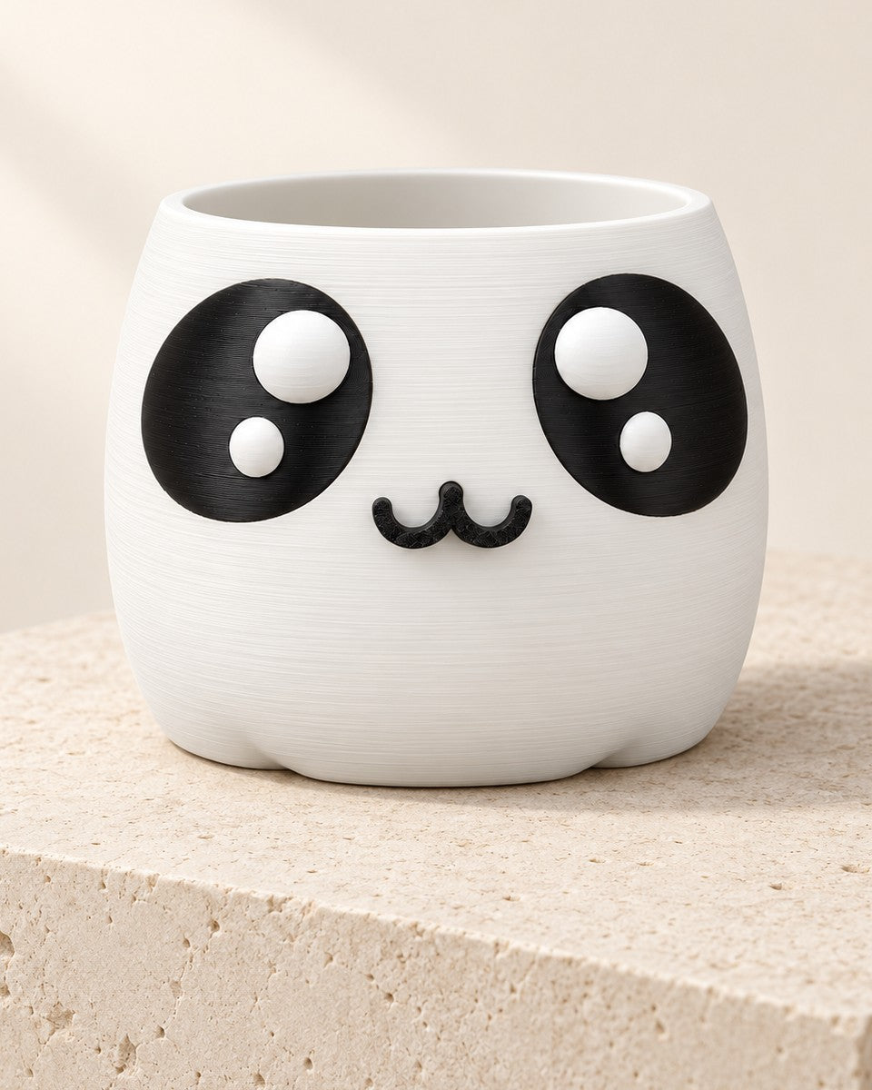Mood Planter: Self-watering face planter whose mouth reads the water level