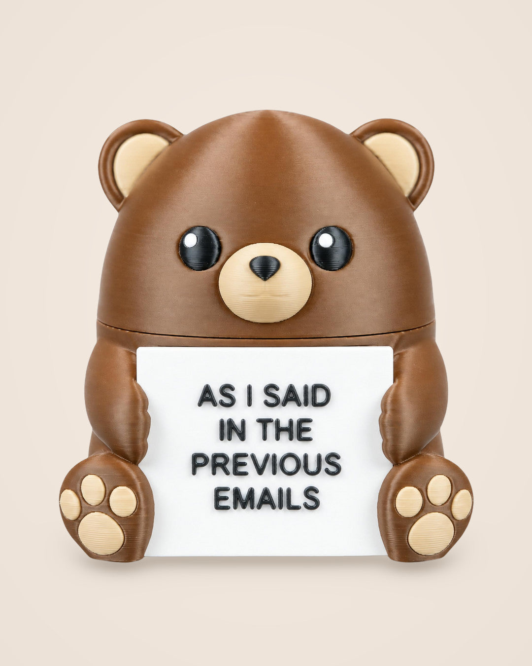 Steady Bear: Desk ornament with a lift-off head and a hidden angry bear