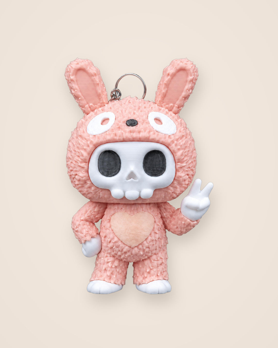 Pink Rabbit Skull Keyring: A pink rabbit-costume character keyring with a mini rabbit charm