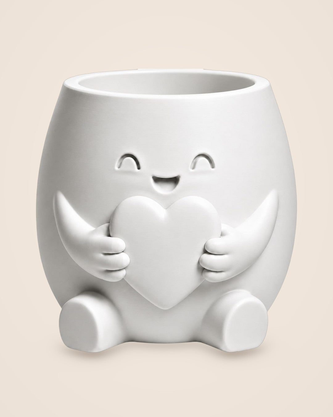 Heart Hug Planter: A smiling pot that holds a heart close, 10 cm tall
