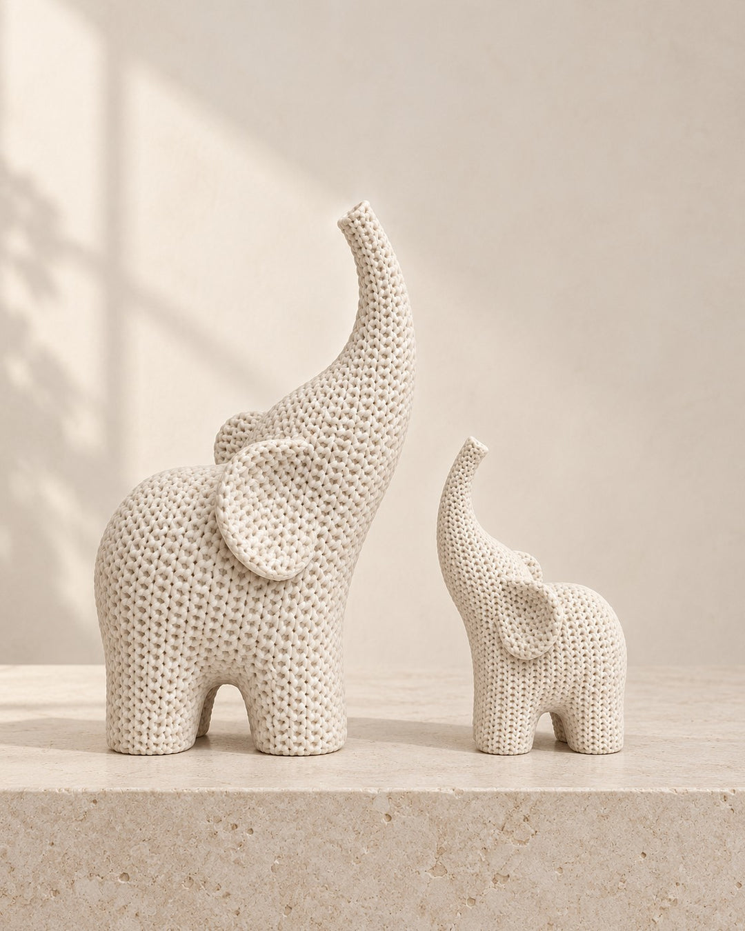 Knitted Elephant Pair: Two textured elephants in matte white, 20 cm and 10 cm