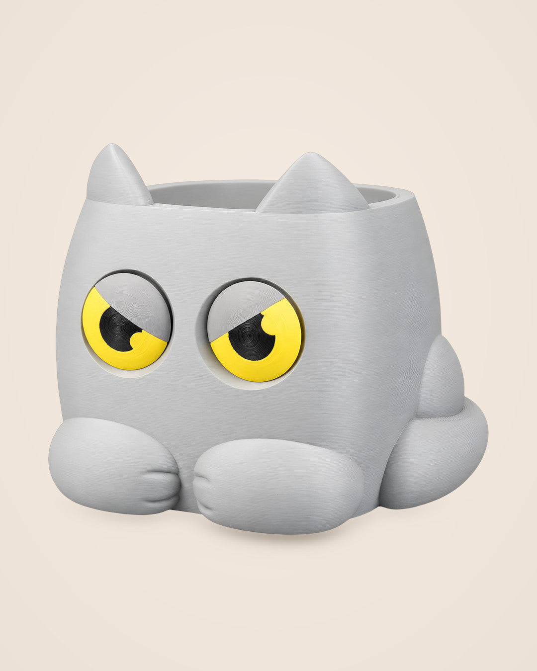 Moody Cat Planter: Self-watering planter with eyes that shift as the water level drops