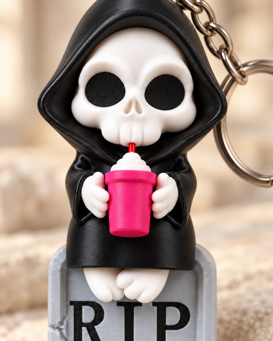 Close-up of the Sweet Rest Reaper Keyring showing fine printed layer lines