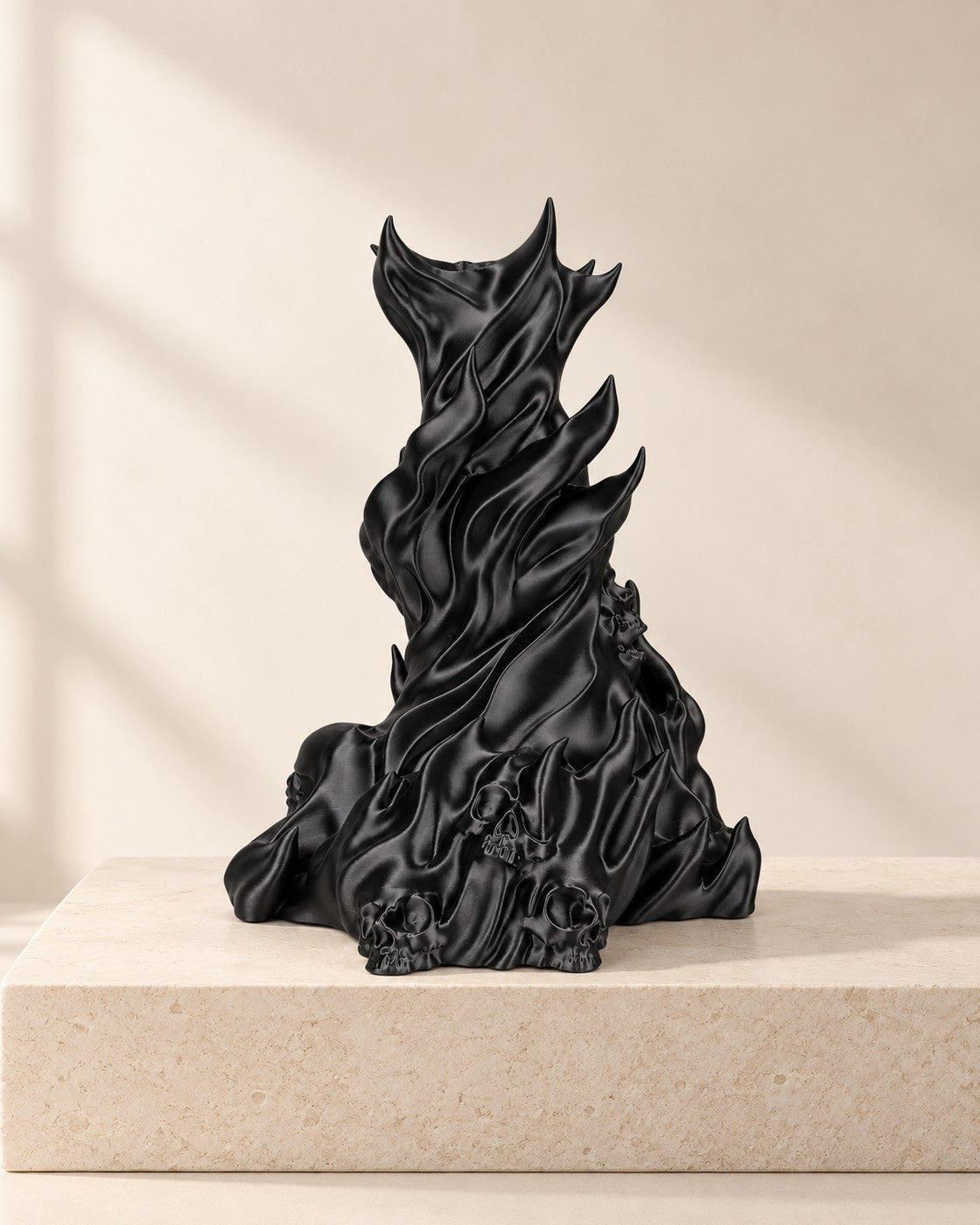 Flame and Skull Stand on a pale limestone plinth, soft studio light