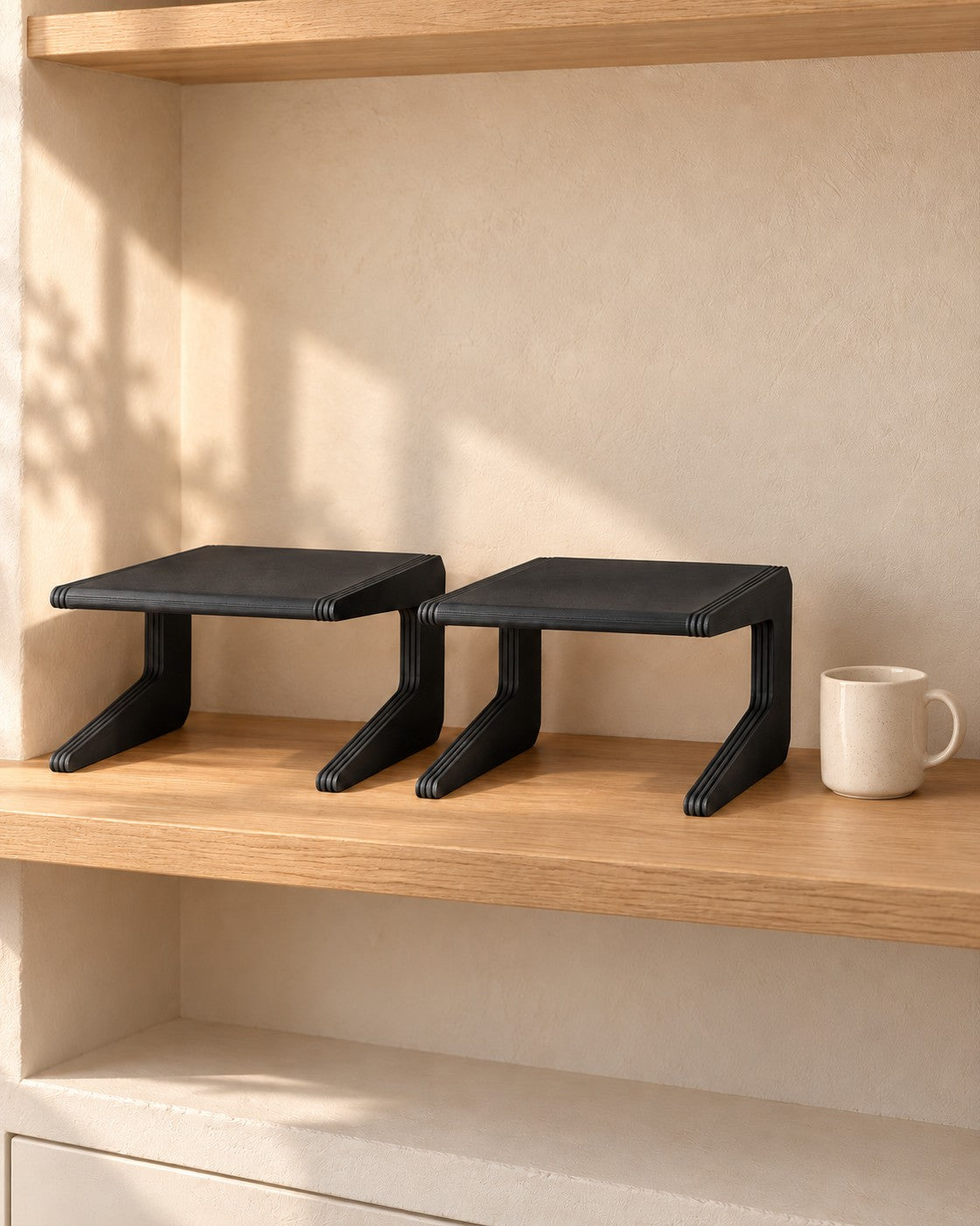 Narrow Shelf Risers in a calm, softly lit interior, shown at true scale