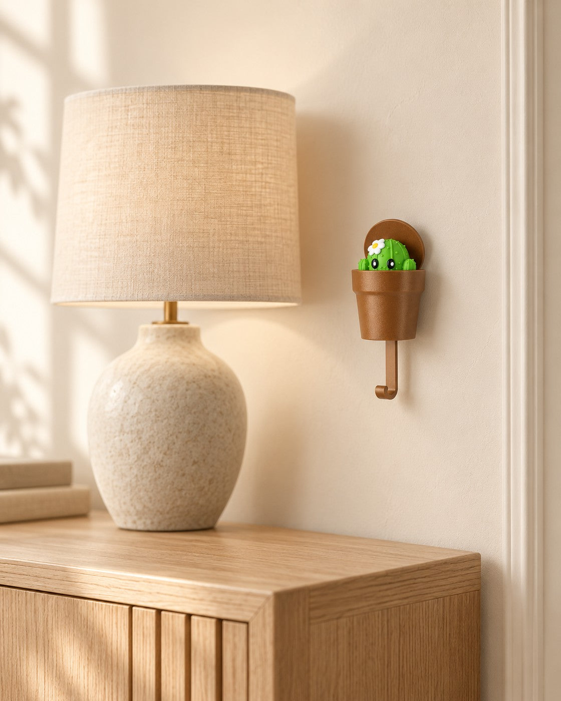 Pop-Up Cactus Key Holder in a calm, softly lit interior, shown at true scale