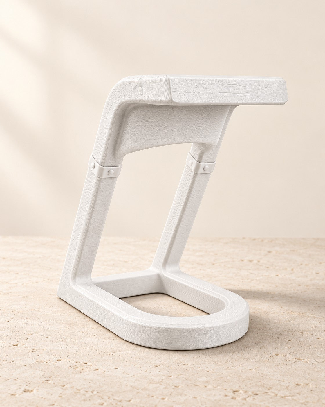 Oak Rest Wine Holder on a pale limestone plinth, soft studio light