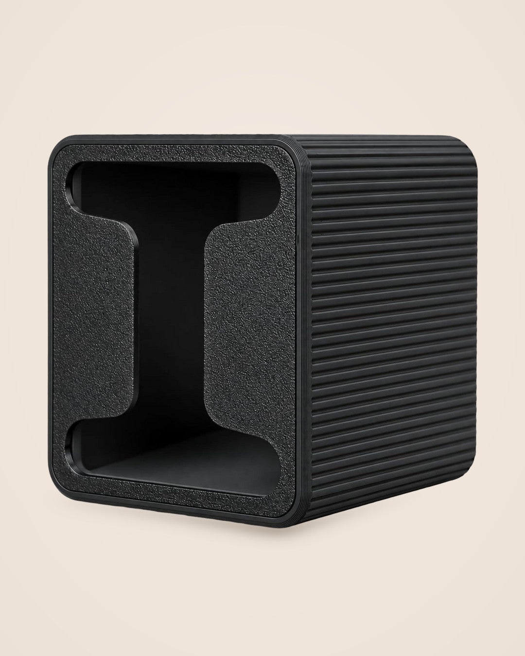 Tea Bag Dispenser: Compact black box with a front-pull opening for wrapped tea bags