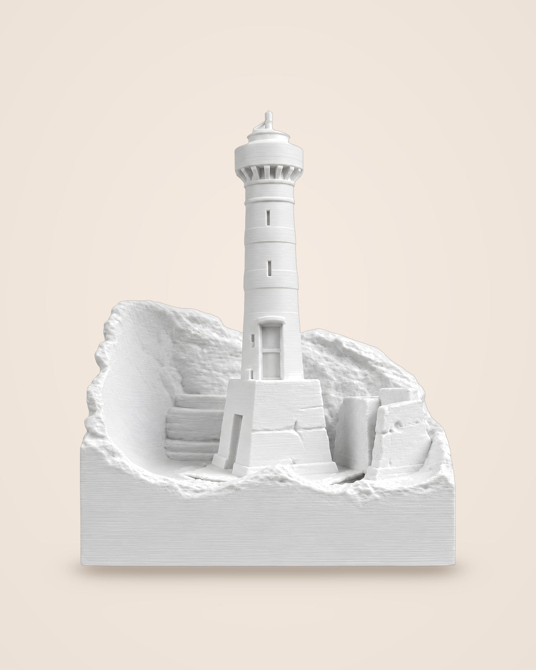 Coastal Lighthouse Lamp: A sculpted lighthouse on a rocky cove, lit warm white by USB