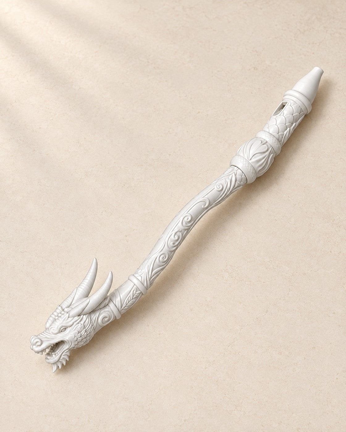 Dragon Flute Ornament on a pale limestone plinth, soft studio light