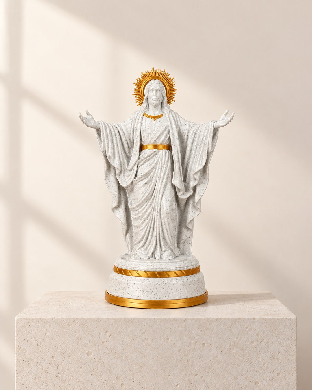 Christ of Light Statue: Open-armed figure in off-white and gold-tone, with a warm LED base