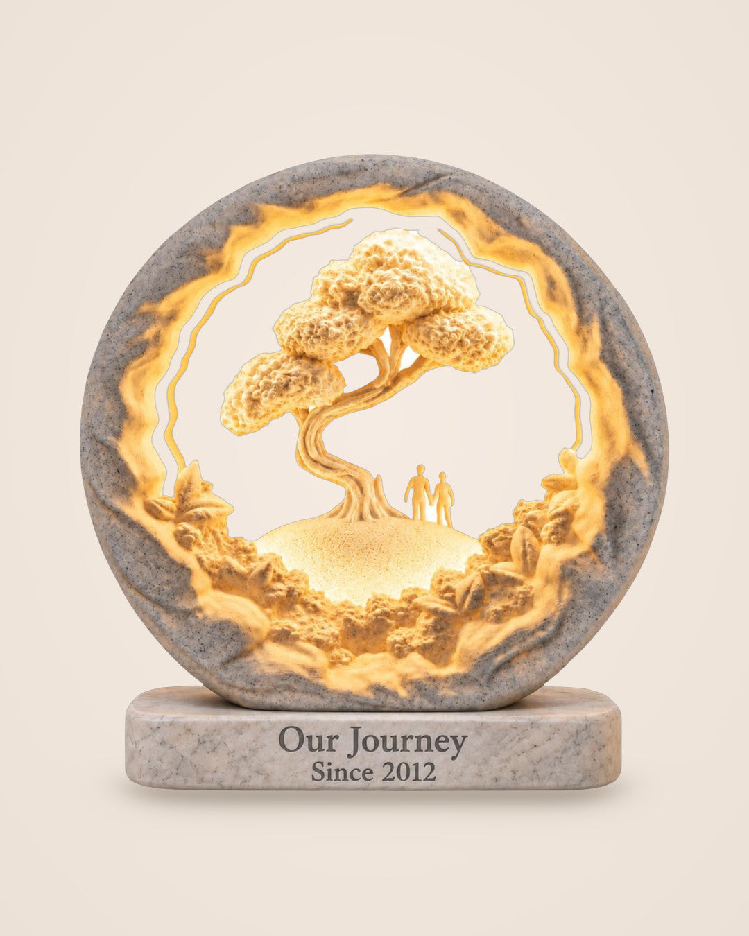 Our Journey Personalised Lamp: Two figures walk beneath a sculpted tree, with your words on the plinth