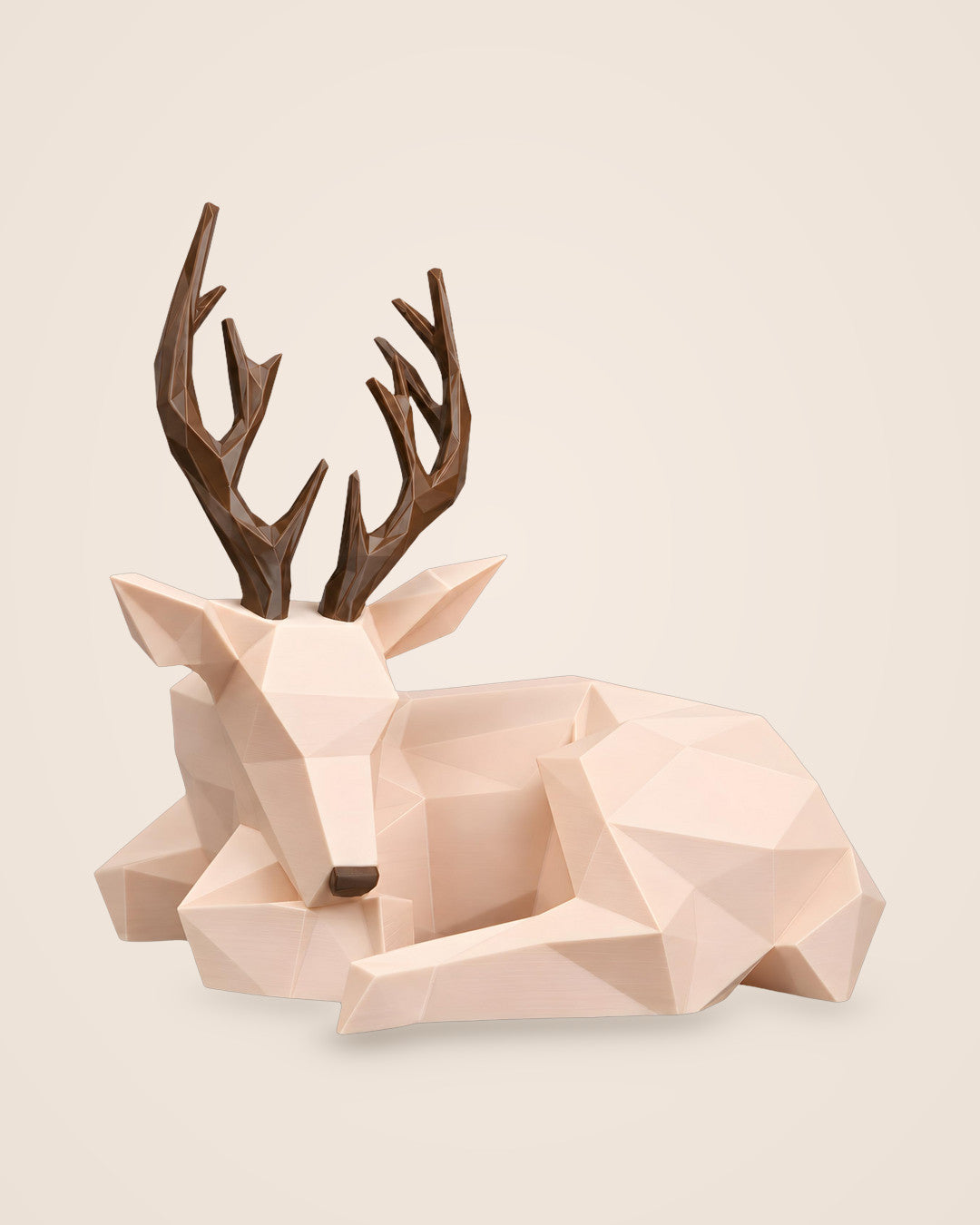Faceted Deer Lamp: A blush low-poly stag lit by a flameless tea light