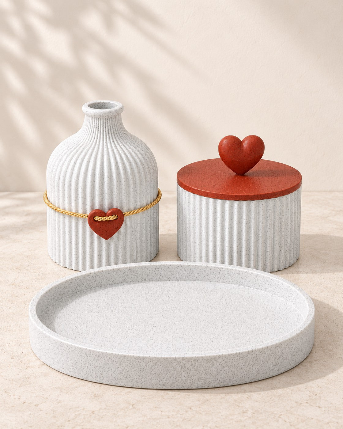 Four-Piece Vanity Set on a pale limestone plinth, soft studio light