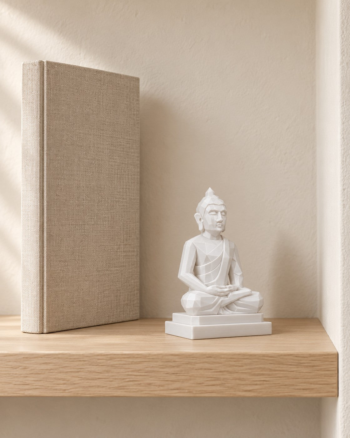 Small Meditating Buddha in a calm, softly lit interior, shown at true scale