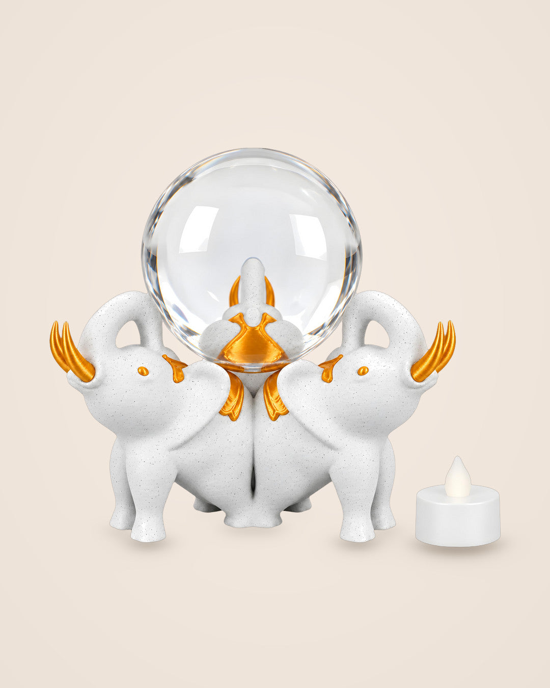 Elephant Trio Crystal Ball Holder: Three marble-effect elephants with gold details, a glass sphere and an LED tealight