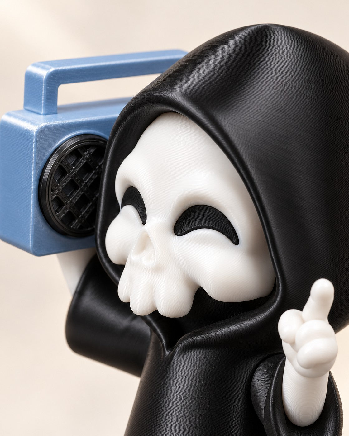 Close-up of the Groove Reaper Figurine showing fine printed layer lines