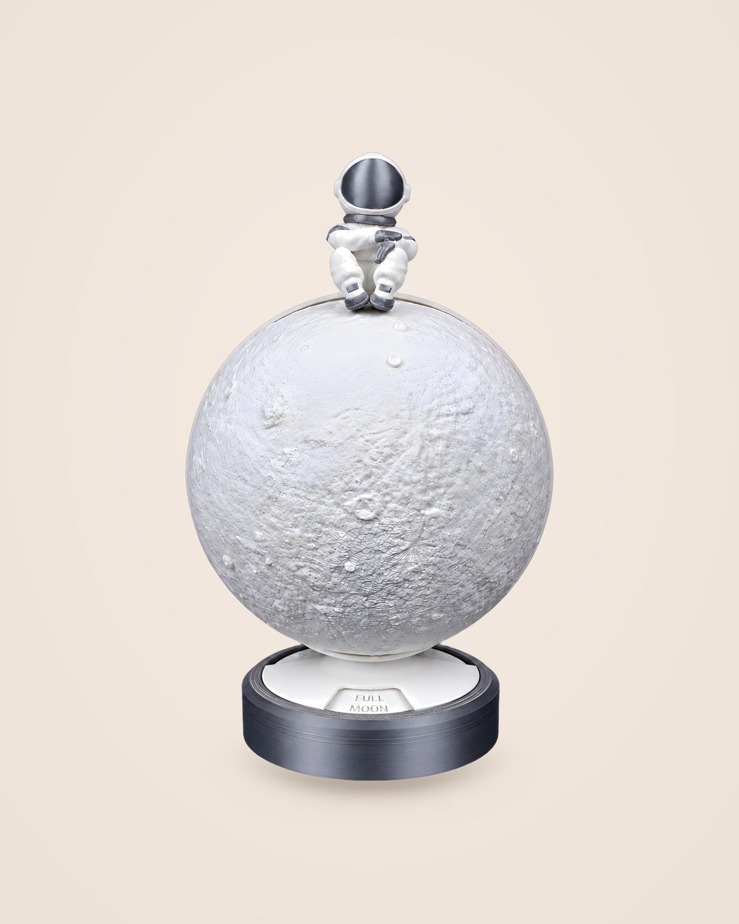 Moon Phase Astronaut Lamp: Crater-textured moon lamp with a seated astronaut and a turning phase base