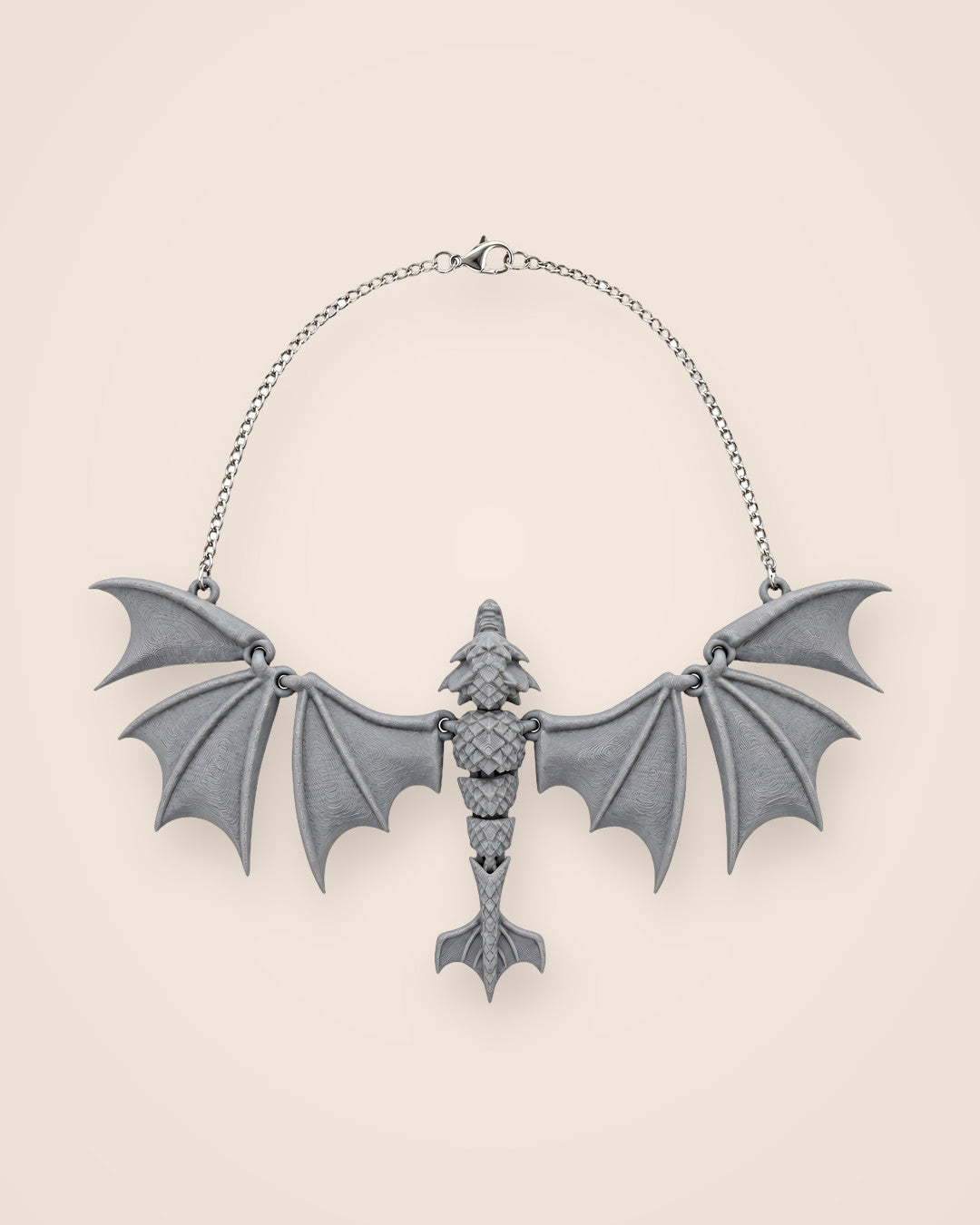 Soaring Fang Necklace: Articulated wyvern pendant with hinged wings on a steel chain